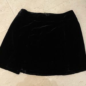 Black velvet mini skirt